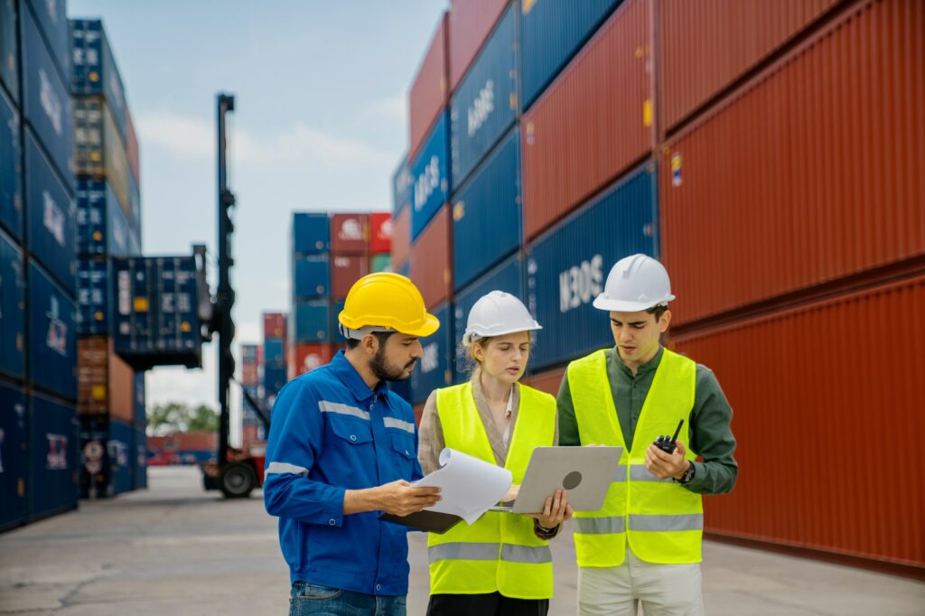 Foreman control loading Containers box to truck for Logistic Import Export.